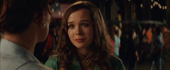 Movie still from “Whip It” (2009), directed by Drew Barrymore – A person with long brown hair; Close Up shot, Over the shoulder angle