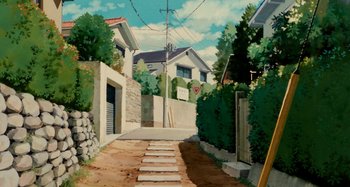 Movie still from “Whisper of the Heart” (1995), directed by Yoshifumi Kondô – An oil painting of an alley way leading to a house; Extreme Wide shot, Low angle