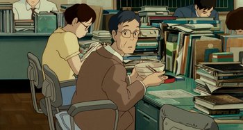 Movie still from “Whisper of the Heart” (1995), directed by Yoshifumi Kondô – A man sitting at a table with a bowl of food; Medium shot, High angle