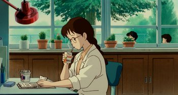 Movie still from “Whisper of the Heart” (1995), directed by Yoshifumi Kondô – A woman sitting at a table drinking a cup of coffee; Medium shot, Low angle