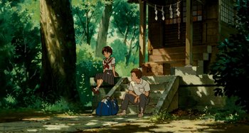 Movie still from “Whisper of the Heart” (1995), directed by Yoshifumi Kondô – A couple of people sitting next to each other on some steps; Wide shot, Low angle