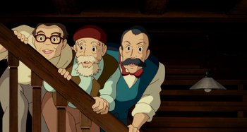 Movie still from “Whisper of the Heart” (1995), directed by Yoshifumi Kondô – A group of men standing next to each other on stairs; Medium shot, High angle