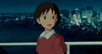 Movie still from “Whisper of the Heart” (1995), directed by Yoshifumi Kondô – A woman standing in front of a city at night; Close Up shot, Over the shoulder angle