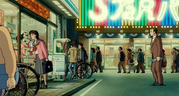 Movie still from “Whisper of the Heart” (1995), directed by Yoshifumi Kondô – A group of people walking down a street; Wide shot, Over the shoulder angle