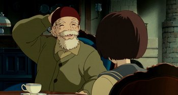 Movie still from “Whisper of the Heart” (1995), directed by Yoshifumi Kondô – An old man sitting in front of a woman; Medium shot, Over the shoulder angle