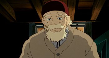 Movie still from “Whisper of the Heart” (1995), directed by Yoshifumi Kondô – An old man with a beard wearing a hat; Close Up shot, Low angle