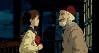 Movie still from “Whisper of the Heart” (1995), directed by Yoshifumi Kondô – An old man and a young boy talking to each other; Medium shot, Over the shoulder angle