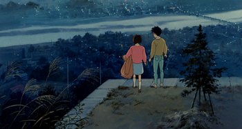 Movie still from “Whisper of the Heart” (1995), directed by Yoshifumi Kondô – Two people standing on a ledge looking at the sky; Wide shot, High angle