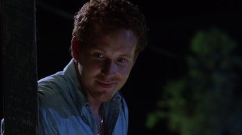 Movie still from “White Oleander” (2002), directed by Peter Kosminsky – A person wearing a blue shirt; Close Up shot, Low angle