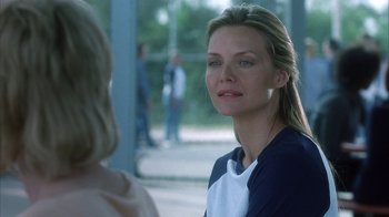 Movie still from “White Oleander” (2002), directed by Peter Kosminsky – A beautiful woman standing next to another beautiful woman; Close Up shot, Over the shoulder angle