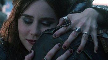 Movie still from “White Oleander” (2002), directed by Peter Kosminsky – A woman is holding a purse while wearing rings; Close Up shot, Overhead angle