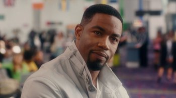 Movie still from “Why Did I Get Married Too?” (2010), directed by Tyler Perry – A person wearing a jacket; Close Up shot, Over the shoulder angle