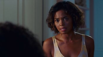 Movie still from “Why Did I Get Married Too?” (2010), directed by Tyler Perry – A person with short curly hair; Close Up shot, Over the shoulder angle