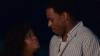 Movie still from “Why Did I Get Married Too?” (2010), directed by Tyler Perry – A man and a woman looking at one another; Close Up shot, Over the shoulder angle
