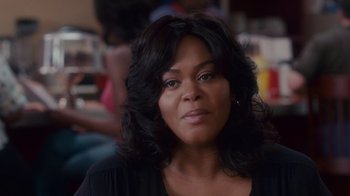 Movie still from “Why Did I Get Married Too?” (2010), directed by Tyler Perry – A person with long black hair; Close Up shot, Over the shoulder angle