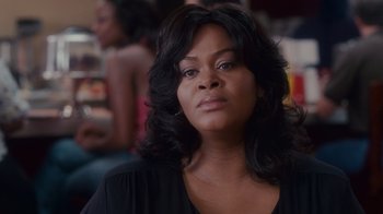 Movie still from “Why Did I Get Married Too?” (2010), directed by Tyler Perry – A person with long black hair; Close Up shot, Over the shoulder angle