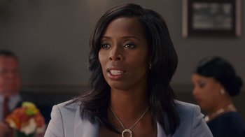 Movie still from “Why Did I Get Married Too?” (2010), directed by Tyler Perry – A woman that is looking at the camera; Close Up shot, Over the shoulder angle