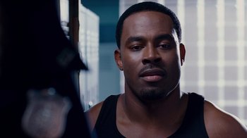 Movie still from “Why Did I Get Married Too?” (2010), directed by Tyler Perry – A person wearing a black shirt; Close Up shot, Over the shoulder angle