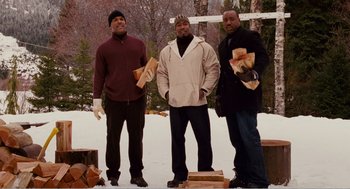 Movie still from “Why Did I Get Married?” (2007), directed by Tyler Perry – A group of men standing next to each other in the snow; Medium shot, Low angle