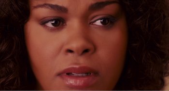 Movie still from “Why Did I Get Married?” (2007), directed by Tyler Perry – A woman's face with brown eyes; Close Up shot, Overhead angle