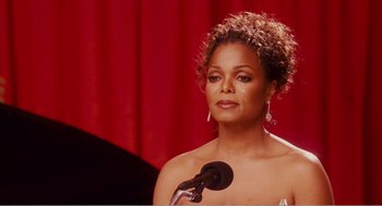Movie still from “Why Did I Get Married?” (2007), directed by Tyler Perry – Janet jackson at a press conference in 2 0 0 5; Close Up shot, Over the shoulder angle