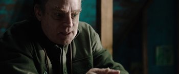 Movie still from “Wildling” (2018), directed by Fritz Böhm – An older man is sitting in front of a window; Close Up shot, Over the shoulder angle