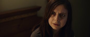 Movie still from “Wildling” (2018), directed by Fritz Böhm – A person looking at the camera; Close Up shot, Over the shoulder angle