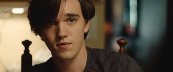 Movie still from “Wildling” (2018), directed by Fritz Böhm – A young man's face; Close Up shot, Over the shoulder angle