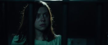 Movie still from “Wildling” (2018), directed by Fritz Böhm – A woman is crying in a dark room; Close Up shot, Low angle