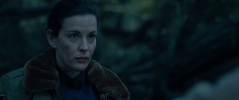 Movie still from “Wildling” (2018), directed by Fritz Böhm – A person wearing a jacket; Close Up shot, Over the shoulder angle