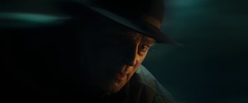 Movie still from “Wildling” (2018), directed by Fritz Böhm – A person wearing a hat; Close Up shot, Low angle