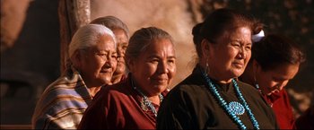 Movie still from “Windtalkers” (2002), directed by John Woo – A group of women standing next to each other; Medium shot, Low angle