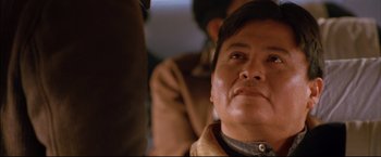 Movie still from “Windtalkers” (2002), directed by John Woo – An older man looking up at the sky; Close Up shot, Low angle