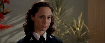 Movie still from “Windtalkers” (2002), directed by John Woo – A person wearing a uniform; Close Up shot, Over the shoulder angle