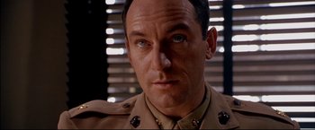 Movie still from “Windtalkers” (2002), directed by John Woo – A person wearing a uniform; Close Up shot, Over the shoulder angle