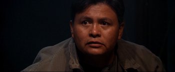 Movie still from “Windtalkers” (2002), directed by John Woo – A person wearing a brown shirt; Close Up shot, Over the shoulder angle