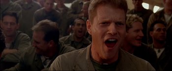 Movie still from “Windtalkers” (2002), directed by John Woo – A group of men standing next to each other; Close Up shot, Low angle