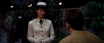 Movie still from “Windtalkers” (2002), directed by John Woo – A woman in a uniform talking to a man in a uniform; Medium shot, Over the shoulder angle