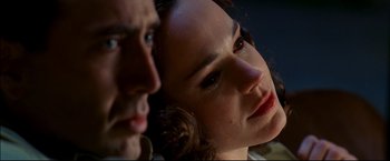 Movie still from “Windtalkers” (2002), directed by John Woo – A person looking at the camera; Close Up shot, Over the shoulder angle