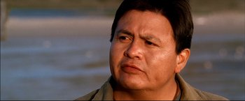 Movie still from “Windtalkers” (2002), directed by John Woo – A person looking at the camera; Close Up shot, Low angle