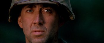 Movie still from “Windtalkers” (2002), directed by John Woo – A person wearing a hat; Close Up shot, Low angle