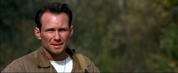 Movie still from “Windtalkers” (2002), directed by John Woo – A person wearing a jacket; Close Up shot, Low angle