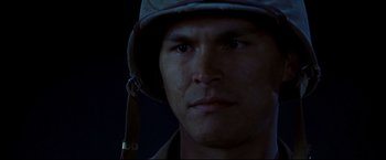 Movie still from “Windtalkers” (2002), directed by John Woo – A person wearing a helmet; Close Up shot, Low angle