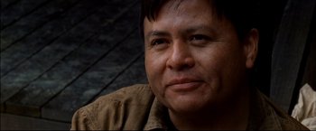 Movie still from “Windtalkers” (2002), directed by John Woo – A man's face with a brown shirt; Close Up shot, Low angle