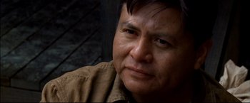 Movie still from “Windtalkers” (2002), directed by John Woo – A person wearing a brown shirt; Close Up shot, Over the shoulder angle