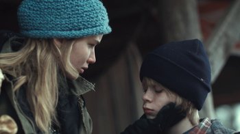 Movie still from “Winter's Bone” (2010), directed by Debra Granik – A woman and a child looking at each other; Close Up shot, Over the shoulder angle