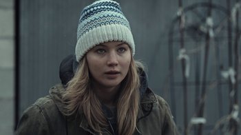 Movie still from “Winter's Bone” (2010), directed by Debra Granik – A woman wearing a white hat and a jacket; Close Up shot, Over the shoulder angle
