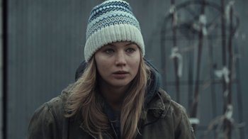 Movie still from “Winter's Bone” (2010), directed by Debra Granik – A woman wearing a white hat and a jacket; Close Up shot, Over the shoulder angle