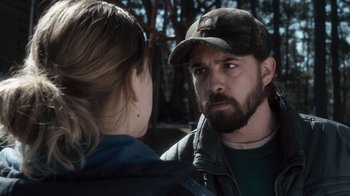 Movie still from “Winter's Bone” (2010), directed by Debra Granik – A man and a woman looking at one another; Close Up shot, Over the shoulder angle