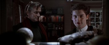 Movie still from “Wonder Boys” (2000), directed by Curtis Hanson – A man and a woman sitting at a dining table; Close Up shot, Over the shoulder angle